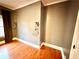 Stylish bedroom details include hardwood floors, pendant lighting and neutral paint at 549 Atwood Sw St, Atlanta, GA 30310