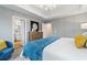 Comfortable main bedroom with a plush bed, ample natural light, and stylish decor at 903 Eagle Ave, Riverdale, GA 30296