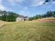 Large backyard with an endless lawn and privacy fence at 1465 Leach Dr, Lawrenceville, GA 30045