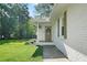 Inviting entrance featuring a charming front porch and well-maintained landscaping at 2110 Argyle Se Dr, Smyrna, GA 30080