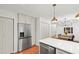 Spacious kitchen featuring stainless steel appliances, ample cabinet space, and a cozy dining area at 2110 Argyle Se Dr, Smyrna, GA 30080