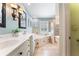 Bright bathroom with double vanity, soaking tub, and separate shower, offering a luxurious retreat at 2719 Cravey Ne Dr, Atlanta, GA 30345