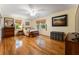 Large bedroom with hardwood floors, neutral colors, and bright windows at 2719 Cravey Ne Dr, Atlanta, GA 30345