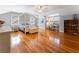 Spacious bedroom with hardwood floors, natural light, and a four-poster bed at 2719 Cravey Ne Dr, Atlanta, GA 30345