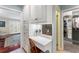 Convenient hallway featuring built-in storage and a vanity area, adding functionality to the living space at 2719 Cravey Ne Dr, Atlanta, GA 30345