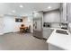 A modern kitchenette with stainless steel appliances and gray cabinets at 2719 Cravey Ne Dr, Atlanta, GA 30345