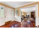 Elegant entry way with hardwood floors, opening to a traditionally furnished living room at 2719 Cravey Ne Dr, Atlanta, GA 30345