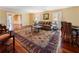 Spacious living room featuring hardwood floors, a patterned rug, and natural light at 2719 Cravey Ne Dr, Atlanta, GA 30345