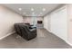 A cozy living room features a large sectional sofa, a TV, and built in closets at 2719 Cravey Ne Dr, Atlanta, GA 30345