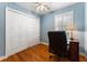 Cozy office with hardwood floors, natural light from shuttered window, and closet at 2719 Cravey Ne Dr, Atlanta, GA 30345