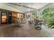 Outdoor patio with stone flooring, comfortable seating, and views of the surrounding greenery at 2719 Cravey Ne Dr, Atlanta, GA 30345