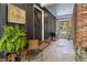Welcoming covered porch with stone flooring, offering a cozy spot to enjoy the outdoors at 2719 Cravey Ne Dr, Atlanta, GA 30345