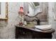 Powder room with a stylish vanity and decorative mirror at 5318 Brooke Farm Dr, Dunwoody, GA 30338