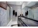 Bathroom features a double sink and large mirror at 5318 Brooke Farm Dr, Dunwoody, GA 30338
