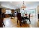 Spacious kitchen featuring stained cabinets, hardwood floors, and stainless steel appliances at 5318 Brooke Farm Dr, Dunwoody, GA 30338