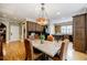 Inviting kitchen with ample cabinets, hardwood floors, and large island perfect for entertaining guests at 5318 Brooke Farm Dr, Dunwoody, GA 30338