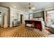Bright main bedroom with large windows, hardwood floors, and sitting area at 5318 Brooke Farm Dr, Dunwoody, GA 30338