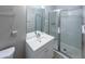 Modern bathroom featuring a sleek glass-enclosed shower, new vanity and fixtures at 6225 Pebble Dr, Douglasville, GA 30135