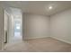 Bedroom featuring wall-to-wall carpet and access to hallway at 907 Eagle Ave, Riverdale, GA 30296