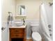 Well-lit bathroom featuring a modern vanity, toilet, and a shower-tub combination at 1501 Clairmont Rd # 1213, Decatur, GA 30033