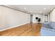 A well lit open concept space with hardwood floors, recessed lighting, and neutral walls at 1501 Clairmont Rd # 1213, Decatur, GA 30033