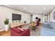 Hardwood floors highlight this living room and office combination. Includes a sliding glass door for balcony access at 1501 Clairmont Rd # 1213, Decatur, GA 30033