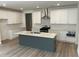 Modern kitchen boasts a large island, stainless steel appliances, and ample cabinet space at 241 Saratoga Dr, Acworth, GA 30102
