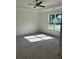 Spacious main bedroom with natural lighting and plush carpet at 241 Saratoga Dr, Acworth, GA 30102