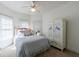 Cozy bedroom with closet space, natural light, and charming decor at 265 Dogwood Walk Ln, Norcross, GA 30071