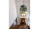Grand foyer with a high ceiling, large arched window and chandelier, and hardwood flooring at 265 Dogwood Walk Ln, Norcross, GA 30071