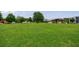 Expansive green space perfect for recreation and community events with walking access to retail and residential at 265 Dogwood Walk Ln, Norcross, GA 30071