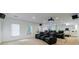 Home theater setup with comfortable recliners, surround sound, and a projector screen for an immersive experience at 265 Dogwood Walk Ln, Norcross, GA 30071