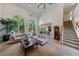 Spacious living room with high ceilings, large windows, and an open floor plan at 265 Dogwood Walk Ln, Norcross, GA 30071