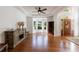 Bright living room featuring hardwood floors, wet bar and large windows at 265 Dogwood Walk Ln, Norcross, GA 30071