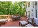 Large outdoor patio with ample seating and beautiful views of the surrounding landscape at 265 Dogwood Walk Ln, Norcross, GA 30071