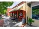 45 South Coffee features outdoor seating on the sidewalk outside the red brick building at 265 Dogwood Walk Ln, Norcross, GA 30071