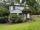 Backyard of white-painted house with lawn and landscaping at 3330 W Shadowlawn Ne Ave, Atlanta, GA 30305