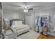 Cozy bedroom with hardwood floors, ceiling fan, and well-appointed furnishings for a relaxing ambiance at 3330 W Shadowlawn Ne Ave, Atlanta, GA 30305