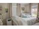 Neutral-toned bedroom featuring a day bed and two windows providing natural light at 3330 W Shadowlawn Ne Ave, Atlanta, GA 30305