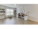 Spacious room with wood floor, decorations and window with natural light at 4650 Silver Meadow Dr, Buford, GA 30519