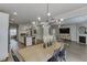 Open floor plan showcasing dining area between the kitchen and living room at 4650 Silver Meadow Dr, Buford, GA 30519