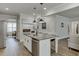 Spacious kitchen with a large island and stainless steel dishwasher at 4650 Silver Meadow Dr, Buford, GA 30519