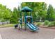Community playground with climbing structures, slides, and green surroundings, perfect for Gathering fun at 4650 Silver Meadow Dr, Buford, GA 30519