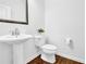 Elegant half-bathroom features modern fixtures and stylish design at 1929 Brightleaf Way, Marietta, GA 30060