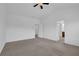Spacious bedroom boasting neutral carpet and high ceilings with easy access to attached bathroom at 1929 Brightleaf Way, Marietta, GA 30060