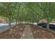 Tree-lined community path featuring lots of shade and sidewalks at 1929 Brightleaf Way, Marietta, GA 30060