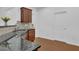 Stylish kitchen features granite countertops, wood cabinets, and stainless steel sink at 1929 Brightleaf Way, Marietta, GA 30060