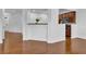 Open-concept living room with hardwood floors and kitchen view at 1929 Brightleaf Way, Marietta, GA 30060