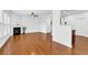 Spacious living room with hardwood floors, fireplace, and open access to the dining and kitchen areas at 1929 Brightleaf Way, Marietta, GA 30060