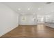 Bright, open living area with wood-look floors and plenty of natural light at 22 Foothills Trl, Sharpsburg, GA 30277